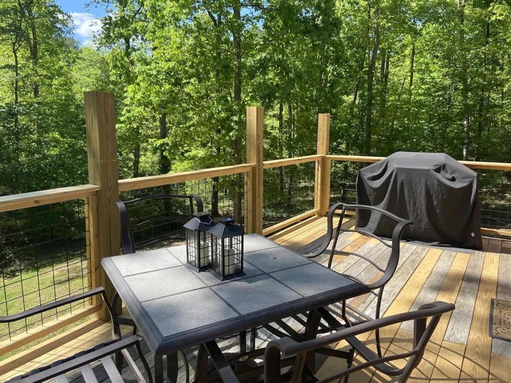 Gas Fireplace, Firepit, And Cedar Adirondack Chair Spencer Exterior photo
