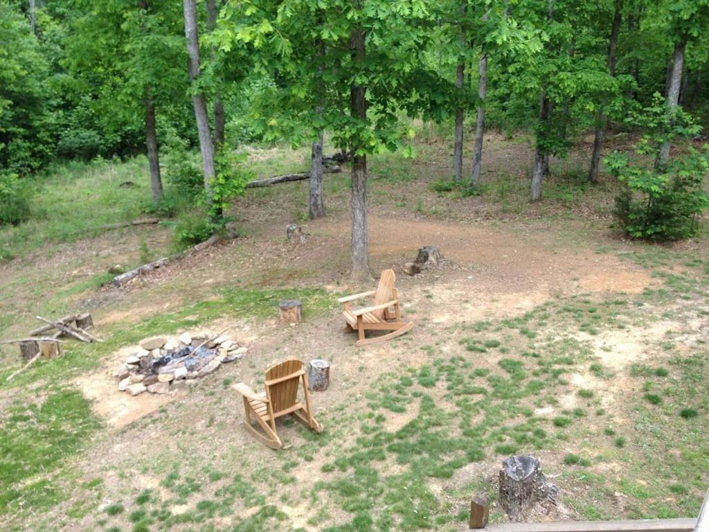 Gas Fireplace, Firepit, And Cedar Adirondack Chair Spencer Exterior photo