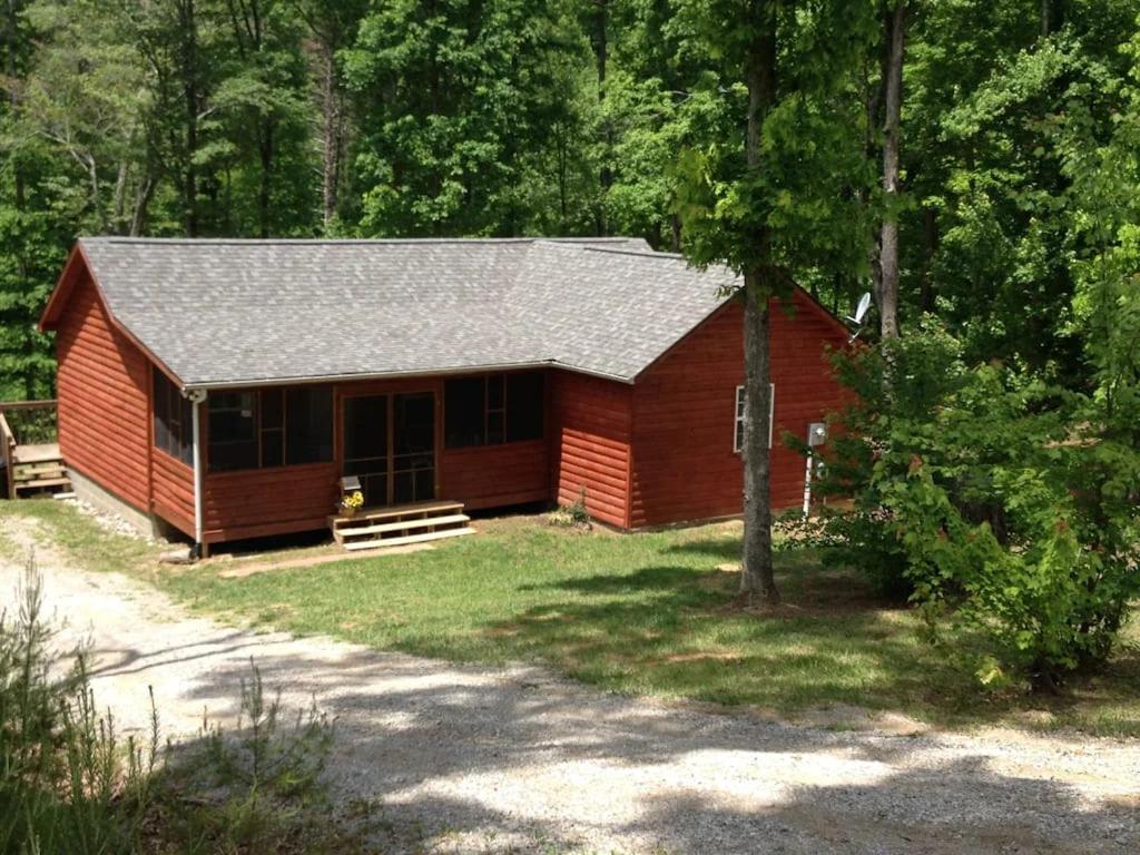 Gas Fireplace, Firepit, And Cedar Adirondack Chair Spencer Exterior photo