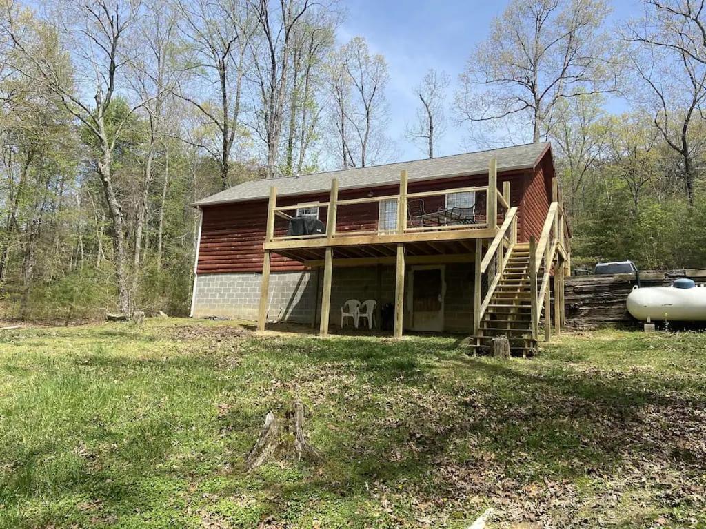 Gas Fireplace, Firepit, And Cedar Adirondack Chair Spencer Exterior photo