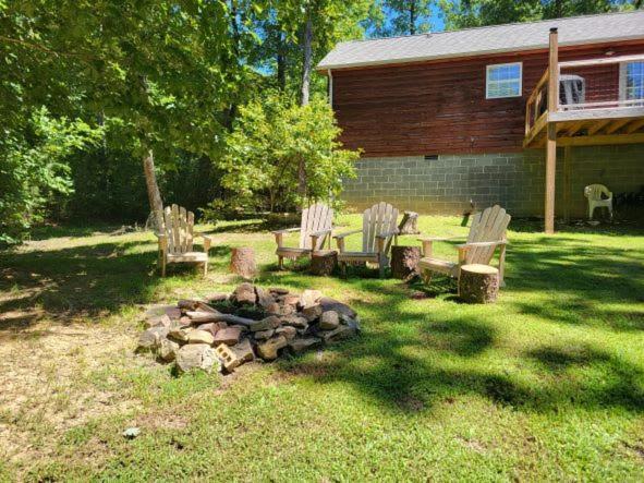 Gas Fireplace, Firepit, And Cedar Adirondack Chair Spencer Exterior photo